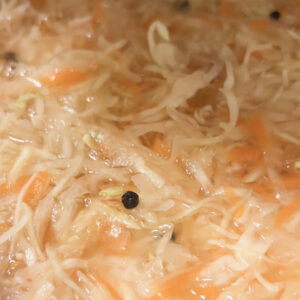 Sauerkraut with visible cabbage and carrot pieces